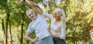 Mature couple exercising outdoors